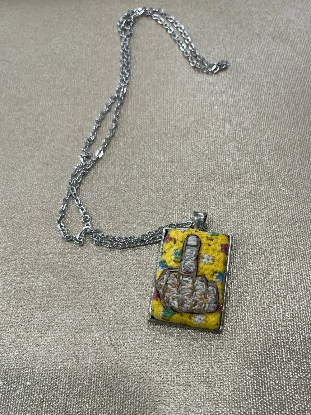 Middle finger hand embroidered pendant and necklace